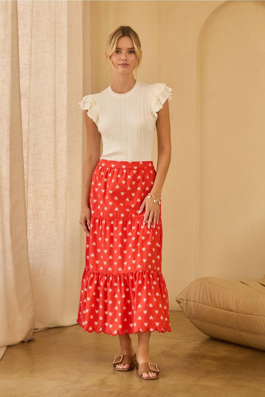 Ruffled Sleeveless Ribbed Knit Top